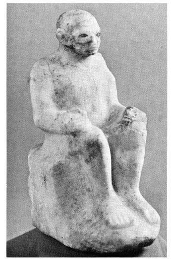 5, 6. Seated statuette of official. Asyut, First Intermediate Period, Egyptian alabaster, h. 11 in. (27.9 cm.). Gift of William Kelly Simpson in memory of William Stevenson Smith. 7977.20.