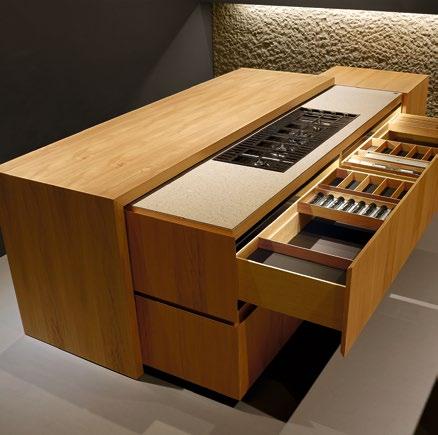 Minotti Cucine. When it s not in use you just roll it back, and nothing suggests it s a kitchen.