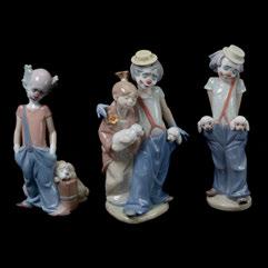454 Three Lladro Clown Figures. 06245 "Destination Big Top"; 7600 "Little Pals",Issued in 1985 and retired in 1992.