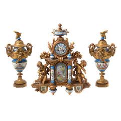 517 Rococo Style Gilt Metal and Ceramic Clock and Garniture Urns.