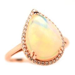 93 Opal, Diamond, 14k Rose Gold Ring. Featuring one pear shaped opal cabochon measuring approximately 14.38 x 10.