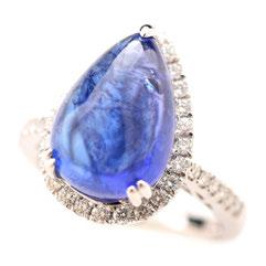 0 dwts} Note: Signed "Cartier ZJ 3063". 121 Sold $5,100.00 122 Tanzanite, Diamond, 14k White Gold Ring. Centering one pear shaped tanzanite cabochon weighing approximately 9.05 cts.
