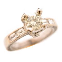 129 Jade, Diamond, 14k White Gold Ring. Centering one elongated oval shaped jadeite cabochon measuring approximately 15 x 7.