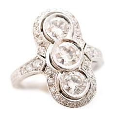 133 Diamond, 18k White Gold Ring. Centering three round brilliant-cut diamonds weighing a total of approximately 1.20 cttw.