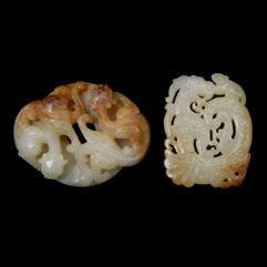 162 Two Russet Jade 'Dragon' Pendants Comprising a bi disc form pendant with dueling chilong carved in high relief, and a rectangular pendant carved in openwork to depict an