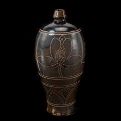 190 Brown Glazed and Incise Decorated Meiping Vase Jin/Yuan Dynasty Delicately decorated with incised lines to feature two bands of lotus. {Height: 13 1/2 inches (34.3 cm)} 190 Sold $480.