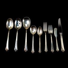 With Silver Plate Tea Spoon, Dinner Fork, Grape Scissors. {Total silver weight 164.063 troy oz.} 389 Sold $1,800.00 390 Sterling Flatware Set with Neoclassical Style Pattern.