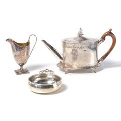 } 398 Sold $600.00 399 Four Sterling Silver Table Articles. Comprising a George III Teapot with Wood Handle and Stand, a Porringer, and a Creamer.