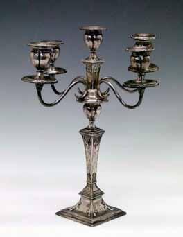 19th Century silver three piece tea service, each piece having half reeded decoration, the circular squat teapot with reeded handle and standing on four bun feet, makers J.w. Story & w.