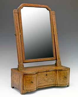Lot 26 Lot 26 18th Century marquetry inlaid mahogany and walnut dressing table mirror, having a rectangular plate, the serpentine front box base