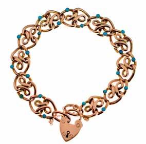 Lot 624 Lot 624 Early 20th Century turquoise bracelet, stamped 9ct, the hollow oval links with a fancy knotted centre, each with a pair of small cabochons, to a padlock clasp, 20cm long, 16.
