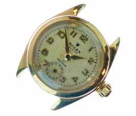 subsidiary seconds dial, the monogrammed and date screw back case bearing the numbers 5004 and 849389 between the lugs, the screw down crown with the Rolex logo, head only, 2.9cm long, 2.