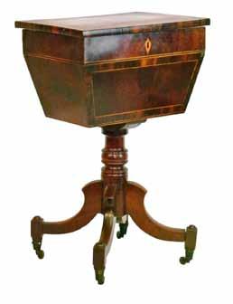 and scroll decoration, 71cm high 80-120 (+ 24% BP*) Lot 54 Burmese heavily carved hardwood octagonal top table, the top having a shaped apron, standing on a