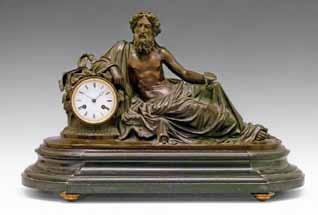 Lot 111 Lot 114 Lot 111 19th Century French bronze mantel clock by Miroy Freres of Paris, the figural case formed as a figure of Bacchus reclining against a pedestal, white enamel dial with Roman