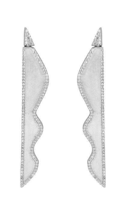 pave. This effortless pair creates a striking constellation of light and is also a reminder of the glowing energy
