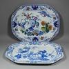 Lot: 1059 Lot: 1064 A 19th Century ironstone china octagonal charger printed in blue with "Pheasant" pattern, 21.25ins x 16.5ins, and one other similar printed in blue with overglazed enamels, 21.
