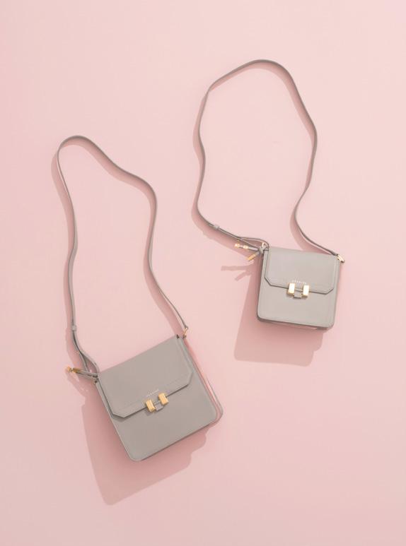 TILDA MINI TABLET 8" An effortless cross-body bag with flap closure, adjustable shoulder strap and signature clasp fastening; available in two different sizes and eight colour combinations.
