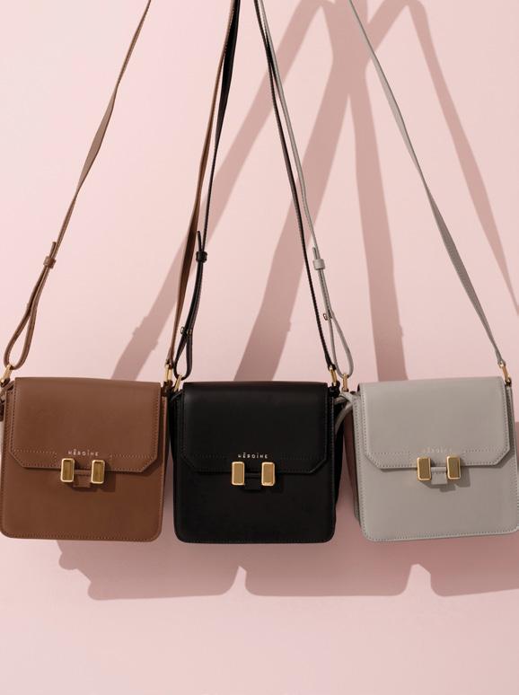 TILDA SMARTPHONE An effortless cross-body bag with flap closure, adjustable shoulder strap and signature clasp fastening; available in two different sizes and eight colour combinations.
