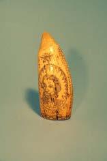 O 106 A scrimshaw-decorated whale's tooth