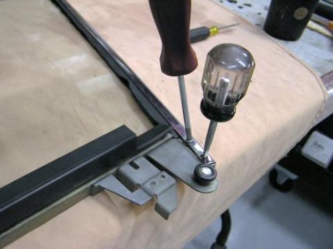 Using an awl or small screwdriver, pry the sash using one frame/sash hole to align the other