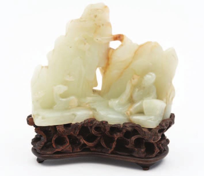 diameter, [some damage and rim chips] with associated stand. 200-400 736 A large Chinese polished hardstone model of a temple lion playing with its young, 27cm. long.