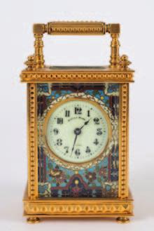 852 852 Mappin & Webb, a small French Edwardian carriage clock, the eightday duration timepiece movement having a platform lever escapement, the champleve enamelled dial having an ivorine centre with