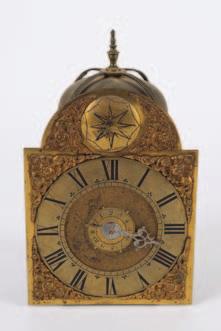 250-350 869 Richard Broad, Bodmin, a modern longcase clock the eight-day duration movement striking the hours on a bell, the break-arch brass dial with black Roman numerals, a moonphase disc to the