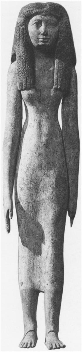 case, the wig has been carved as a separate piece and is dowelled into the head of the statue. Her left leg is advanced and she stands on an inscribed base.