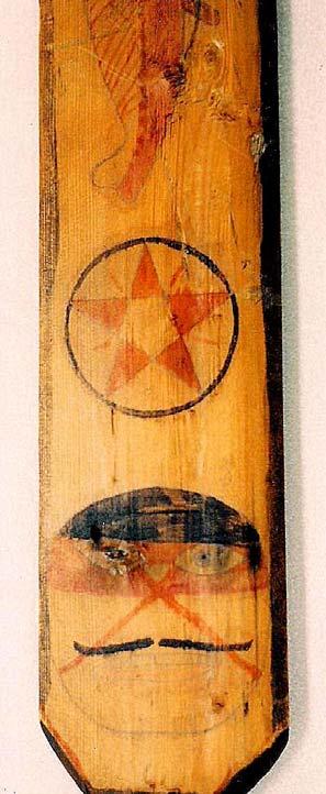 The second ceremonial paddle, VI-J-106, is narrower than the previous one and slightly shorter.