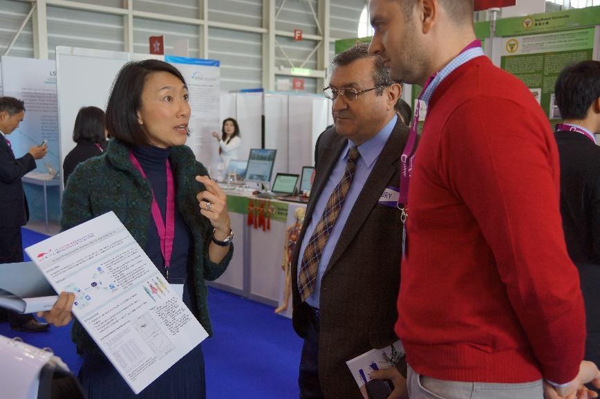 Photo 3: Representative from HKRITA presents their winning entries to visitors, with the aim of introducing HK s R&D strength to the globe.