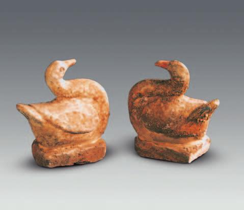 Fig. 24 Porcelain pig (M1:25) Fig. 25 Porcelain dog (M1:27) Fig. 26 Porcelain chickens (M1:28 and 29) Fig. 27 Porcelain ducks (M1:32 and 35) II.