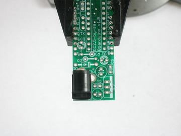 A board vise, soldering iron & solder, diagonal cutters, and a solder sucker (desoldering tool) if you have one. Place the PCB in a vise to make soldering easy!