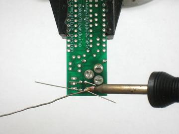 You can tell how to place it because the silkscreened image has a plus near one hole and the capacitor has one long lead. That lead is the positive lead.