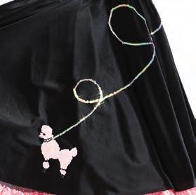 INCLUDES: poly/satin skirt with poodle applique,