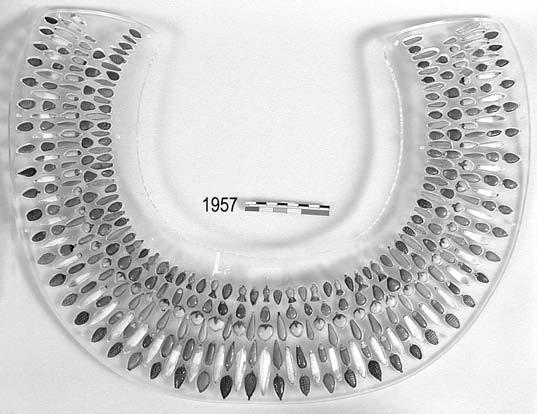 THE DECADE DRAWS TO A CLOSE 149 Figure 30 Faience necklace inscribed with the cartouche of Tutankhamun from Amarna. Petrie Museum. Photograph courtesy of the Petrie Museum, UC 1957.