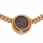 of Lenore Binzer A 18K Bulgari Necklace with Ancient Greek Coin 18K yellow gold necklace by Bulgari featuring an ancient Greek Acarnaia Leucas coin dated 430-400 BC bezel set in the center of