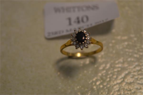 140 A gold sapphire