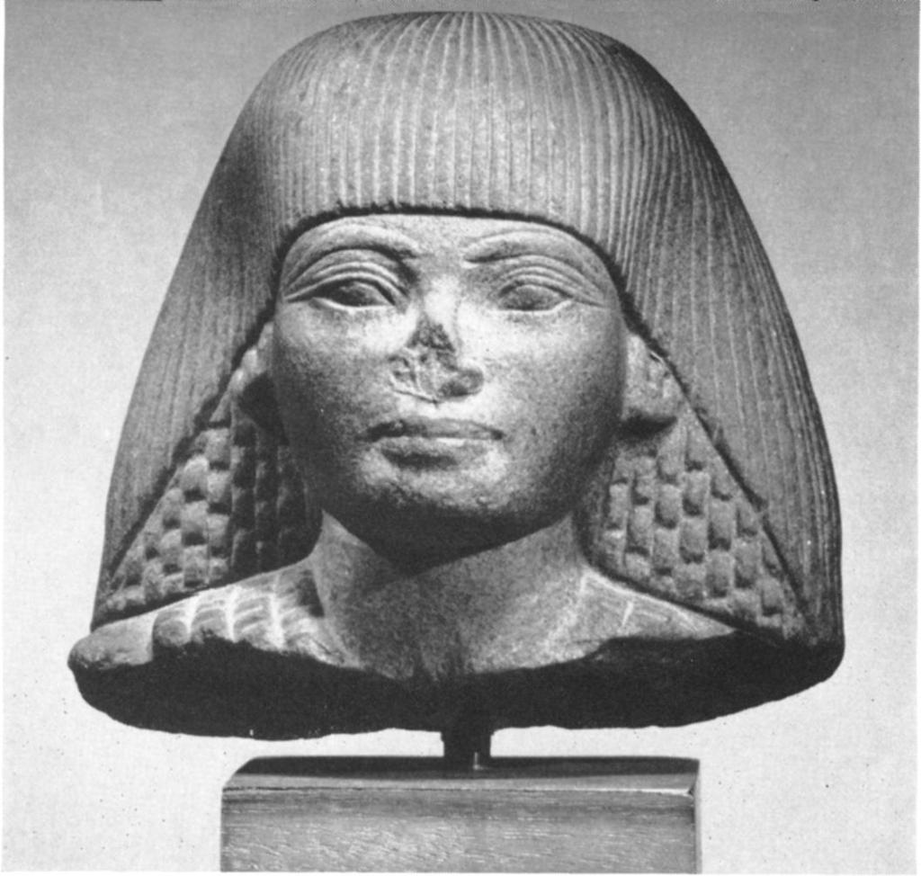 I4 Head of a statue of an official Dynasty XVIII, about 1400 BC Hard green stone, height 5 inches 66993I The treatment of the upper eyelid is a detail that dates this piece to the reign of Amenophis