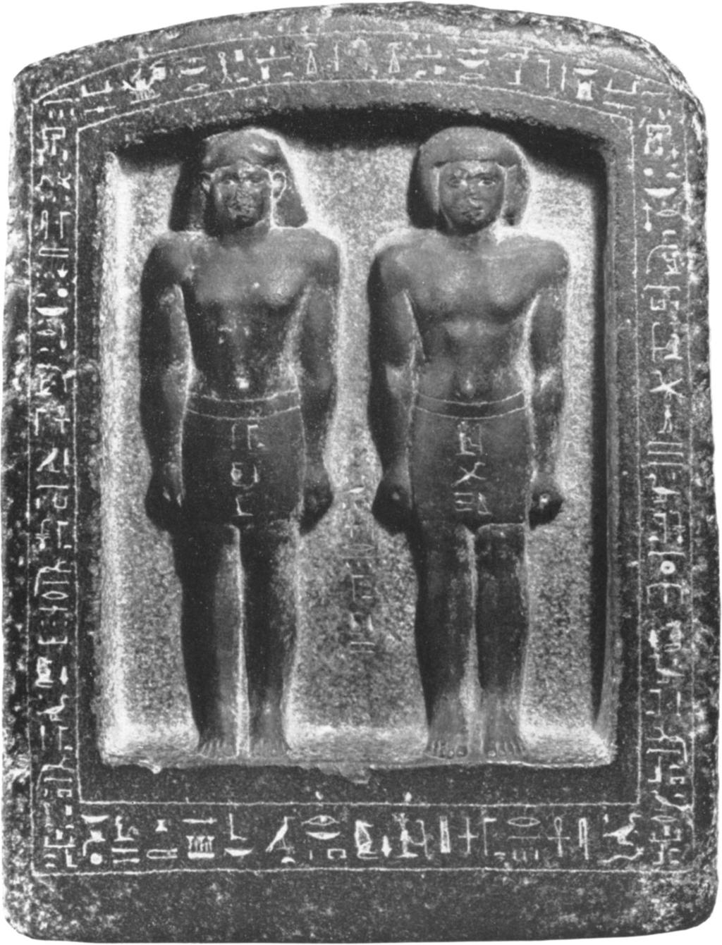 7 Naos stela, showing Pa-inmw and his father, It, from Memphis Dynasty XXVI, about 6oo00 BC Basalt, height 7554 inches 669967 The stela apparently comes from the temple of Ptah at Memphis, and it