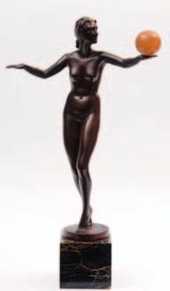 594. Santry An Art Deco bronze figure of a nude female balancing a ball on the back of her left hand,