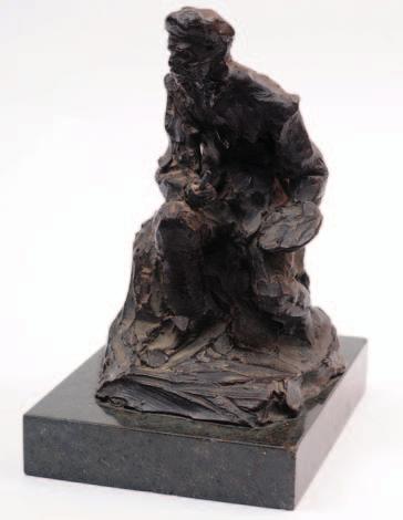 A late 19th/early 20th century bronze study of a seated artist with moustache and beret, holding a palette