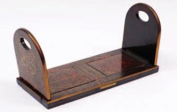 603. A 19th century tortoiseshell and brass inlaid extending book rack, with hinged, arched ends, 55cm fully extended,