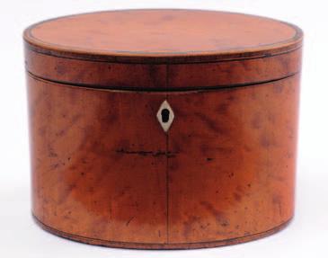 A 19th century enamel oval casket, the pink ground reserve with panels painted with idealised classical