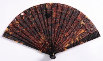 535. A 19th century Chinese carved tortoiseshell brise fan with banded decoration of ships, figures in pagoda landscapes, the guards decorated with exotic birds, immortals and pagodas., 18.5cm.