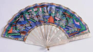 A 19th century Cantonese mandarin fan, the painted paper leaf decorated with figures having painted ivory faces in a palace garden landscape, with mother-ofpearl sticks and guards, 28cm.