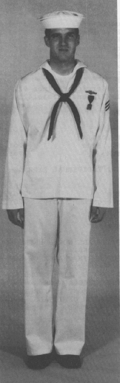 Full Dress White (1) White jumper with large medals and ribbons. Females may wear skirt or slacks. (2) White hat or combination cap.