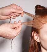 9 Once the hair is loose and away from the scalp, divide the hair into three