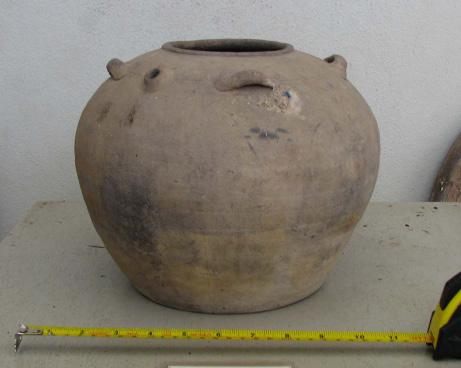 Chinese ceramics of Tang, Five Dynasties and Ten Kingdoms and Southern Song periods were found there, whose details follow: Heshan green glazed ewer