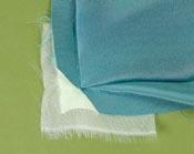 For curved seams, shape the crossgrain strips with a steam iron, gently stretching one edge