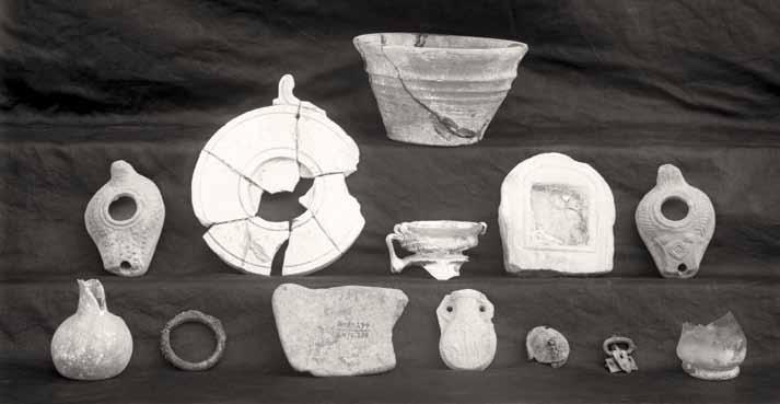 Objects excavated from Tomb 208 of late Romano-Byzantine date, 1926. UPM Image #79608. difficulty.